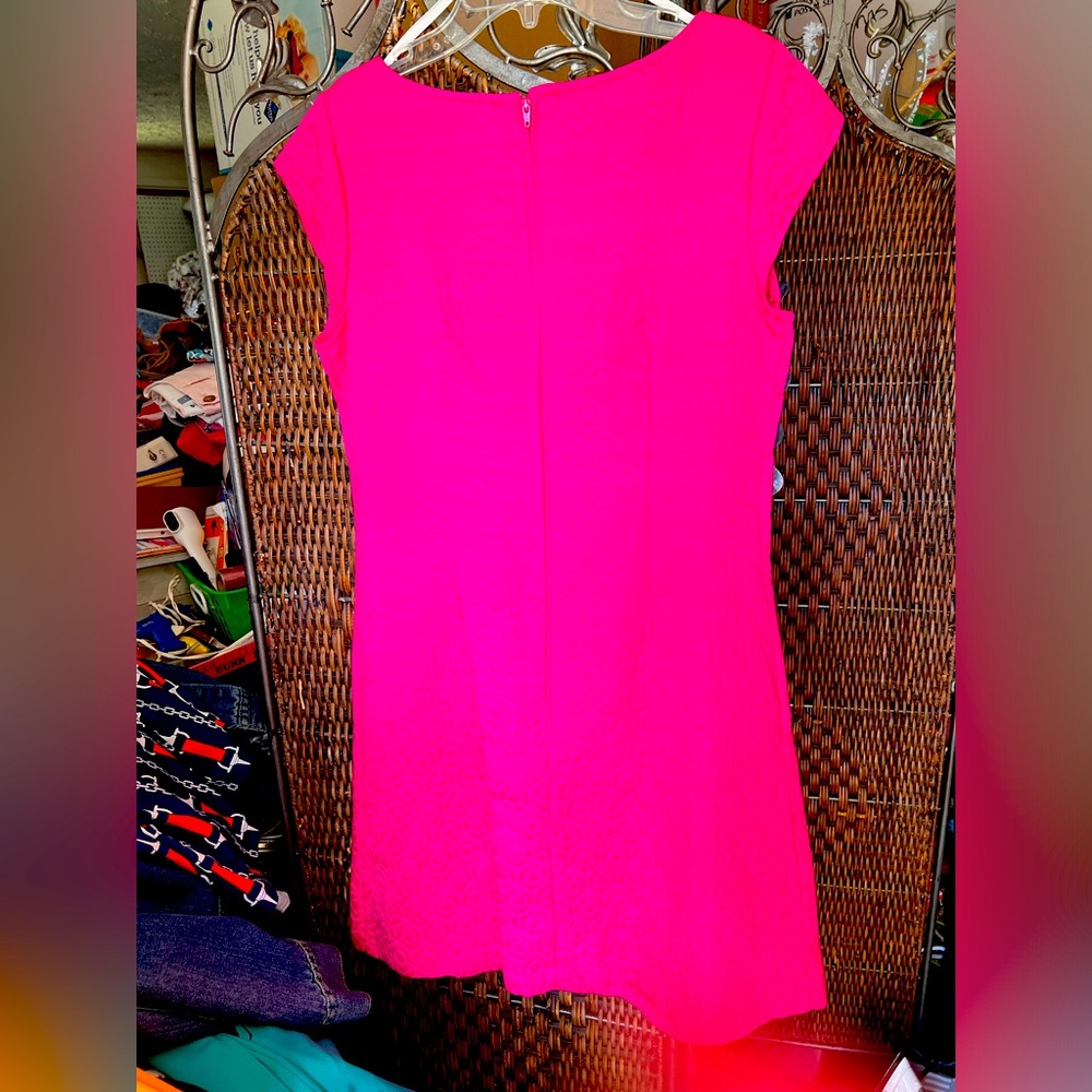 Hot pink dress.